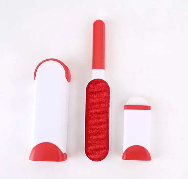 Blue reusable pet hair brush with self-cleaning base for sofas and furniture.
