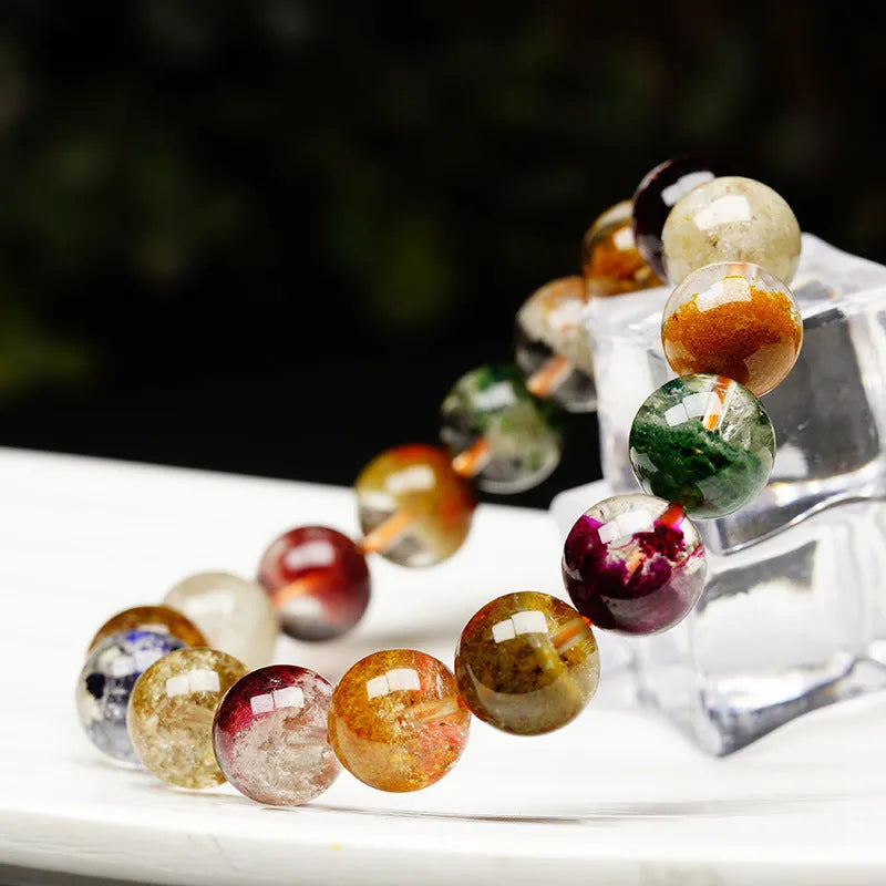 Crystal bracelet with 10mm spherical beads showing ghost cornucopia design in ethnic retro style