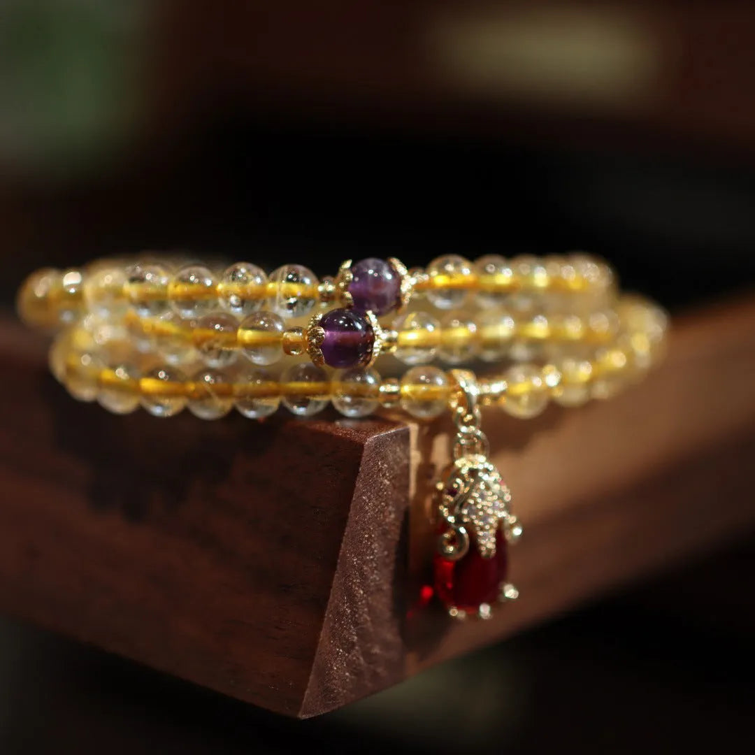 Brazilian gold rutilated quartz bracelet with three gold-plated rings, Chinese style design
