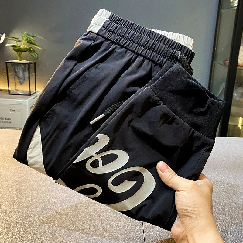 Men's black ultra-thin ice silk ankle banded cropped trousers casual cotton pants