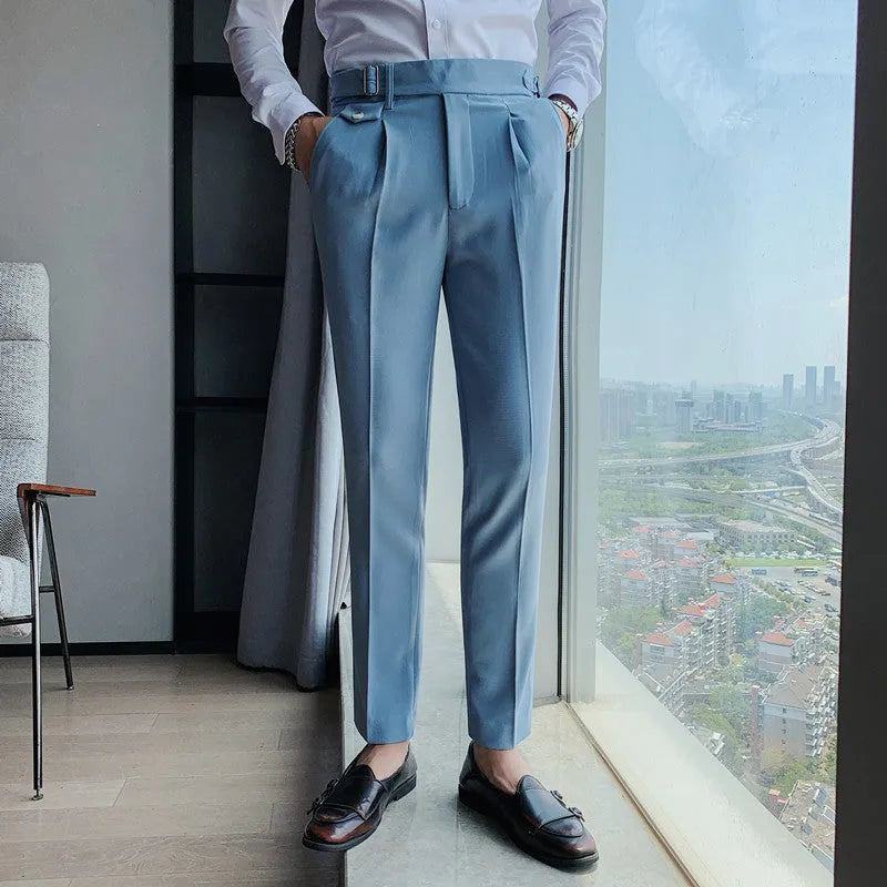 Men's straight-leg casual trousers in solid colours on a neutral background.