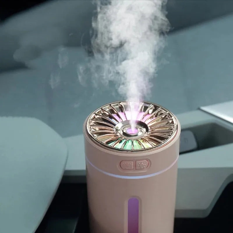 Black wireless air humidifier with colourful LED lights on a car cup holder