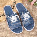 Blue Roman style flat canvas slippers for women with a rubber sole.