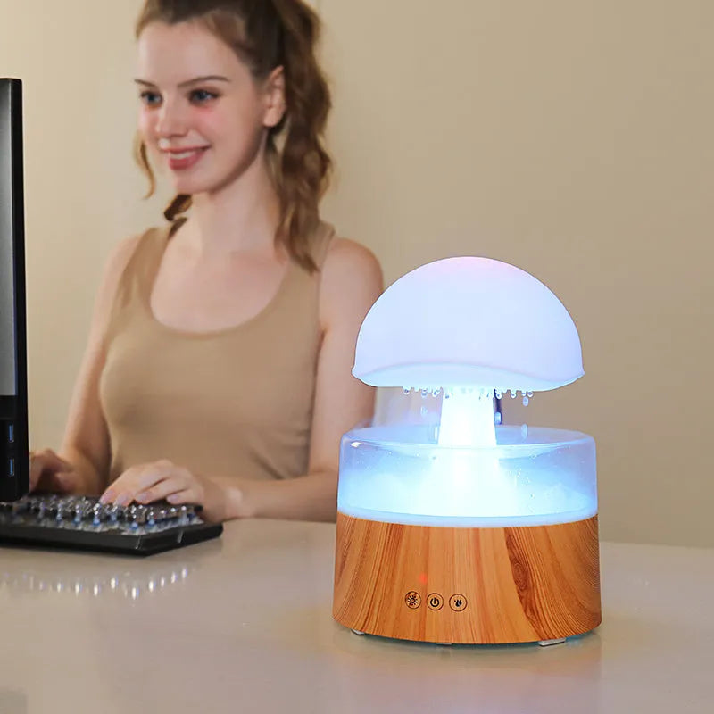 White cloud-shaped humidifier with raindrop simulation and seven-colour lighting, 500ml capacity