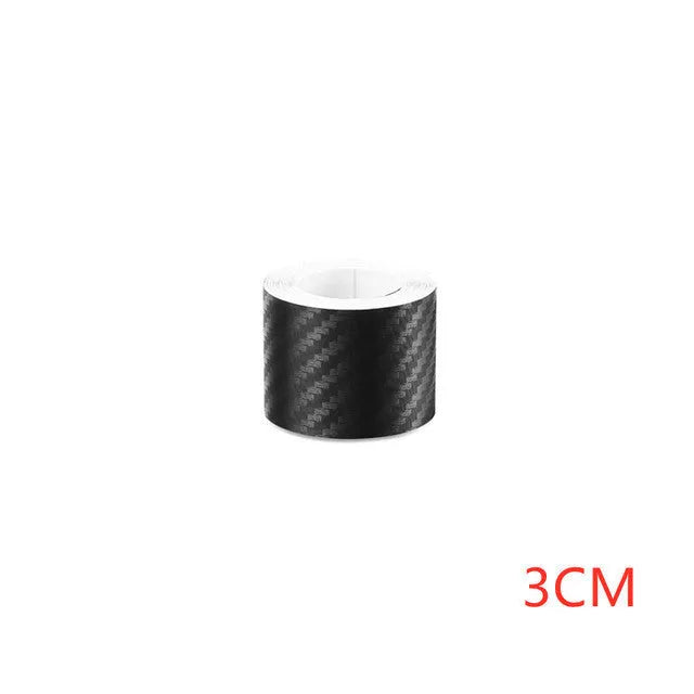 Matte 3D carbon fibre adhesive roll for car door sill protection in various widths.