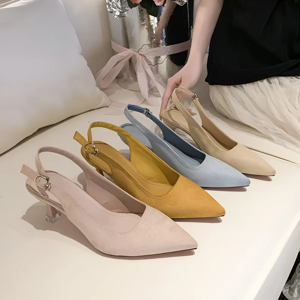 Women's pointed toe stiletto high heels in suede, shown in apricot colour on a light background.