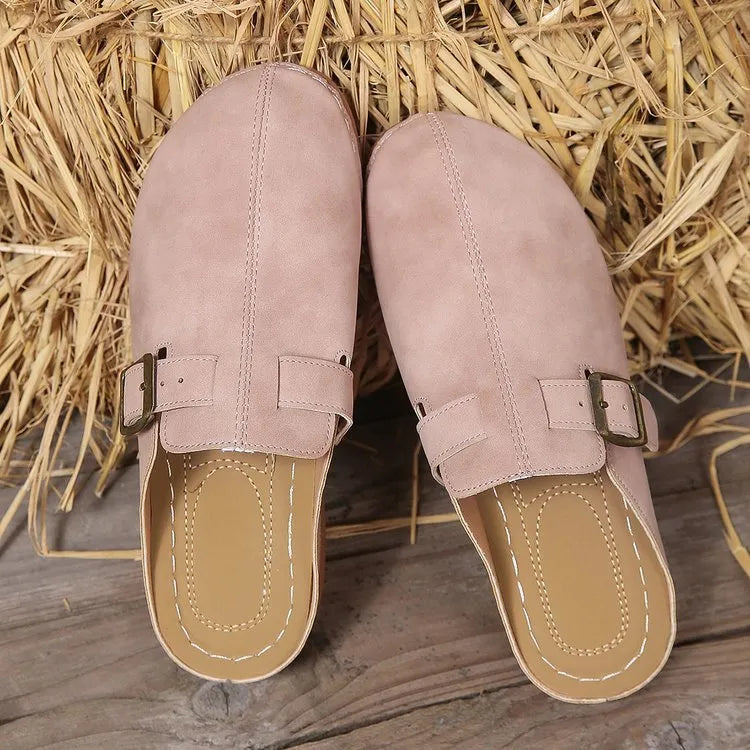 Women's casual wedge slipper in a choice of colours, showing closed toe and rubber sole.