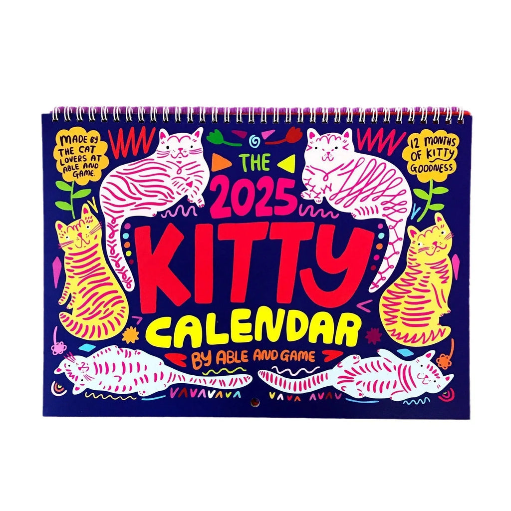 A cat-themed paper wall calendar for 2024 or 2025 displayed flat.