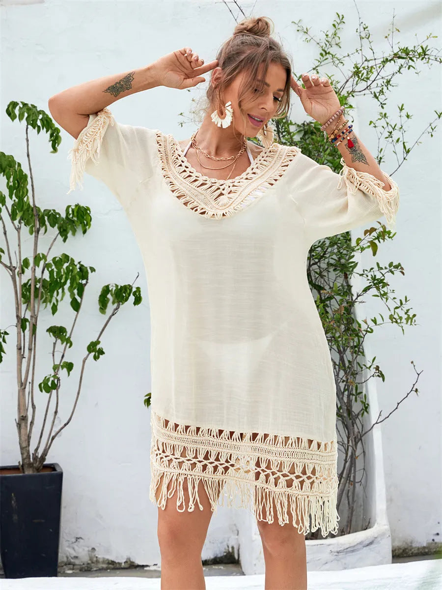 Women's apricot coloured hand-crocheted beach dress with loose free size fit for swimming.