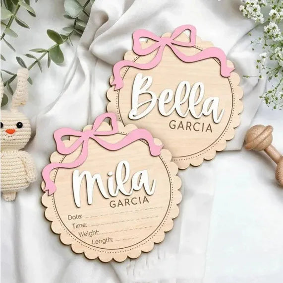 Square wooden baby ornament personalised with a custom name for nursery decor.