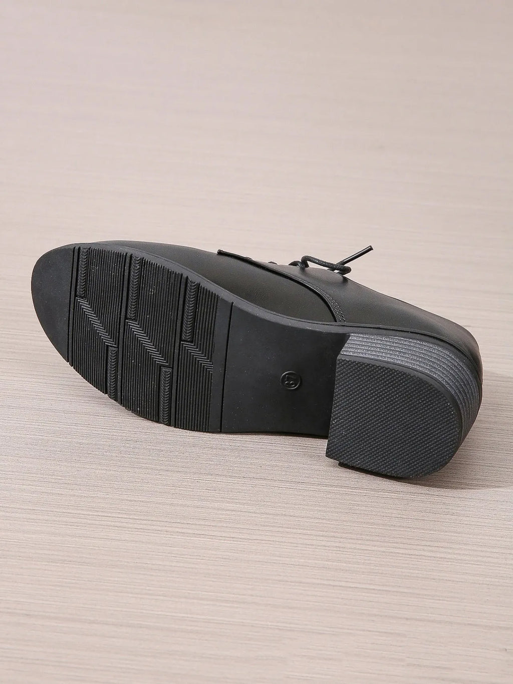 Black women's professional work shoes with chunky heel and pointed toe design