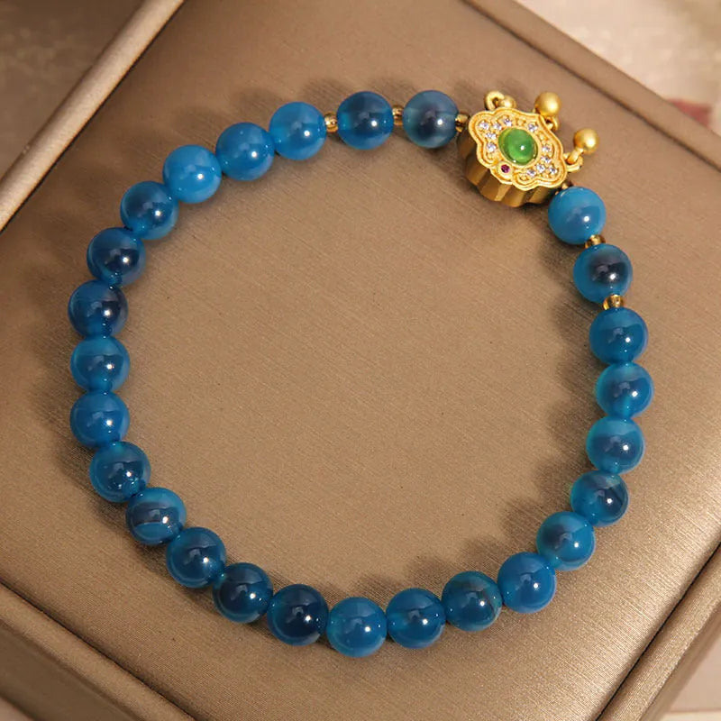 Women's blue sugar heart agate crystal pendant bracelet with safety lock clasp and rhinestone decorative elements