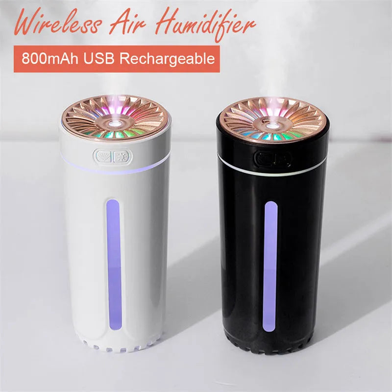 Black wireless air humidifier with colourful LED lights on a car cup holder