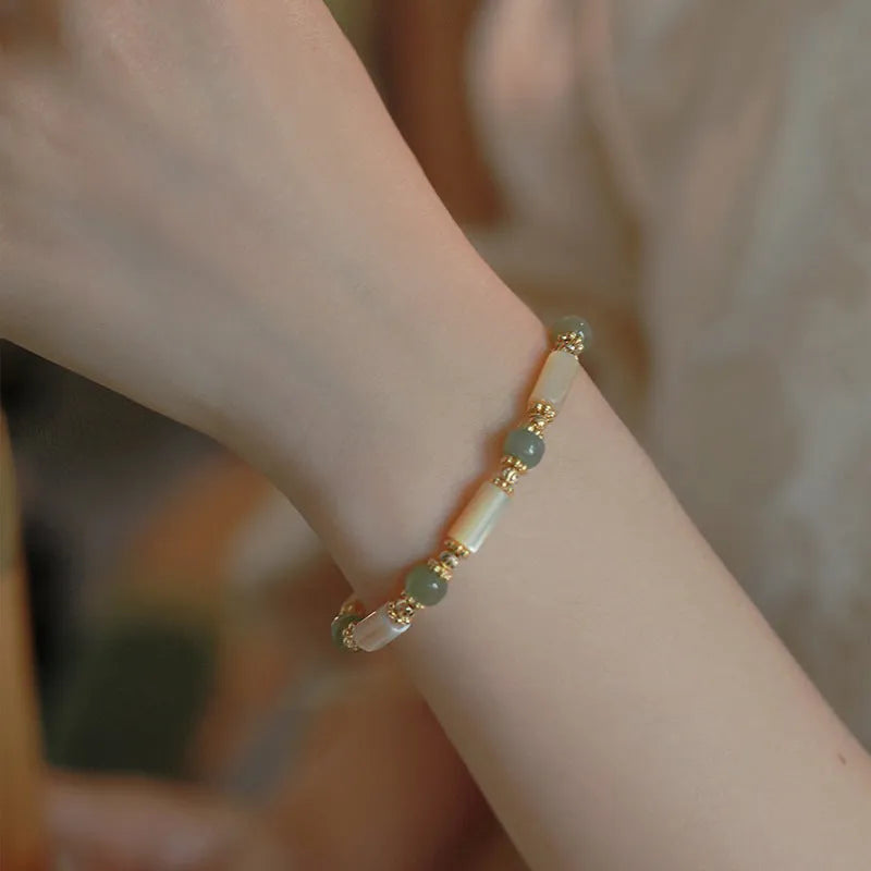 Women's Hetian jade bracelet with round beads in simple geometry design