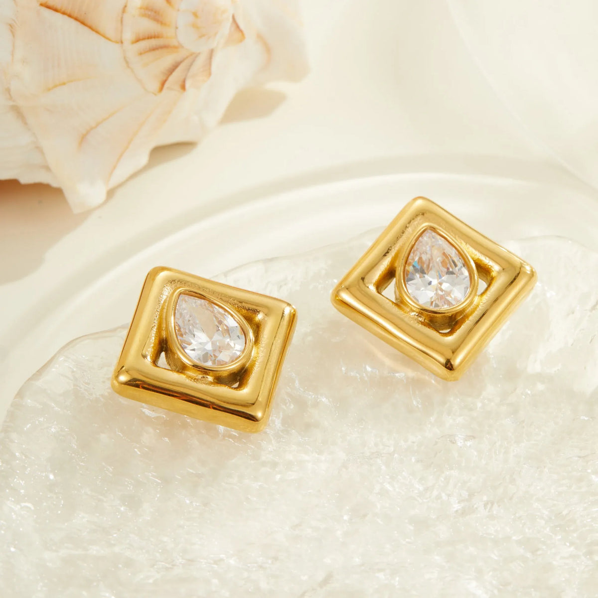 Gold geometric water drop earrings with zircon stones on stainless steel with 18K electroplated finish