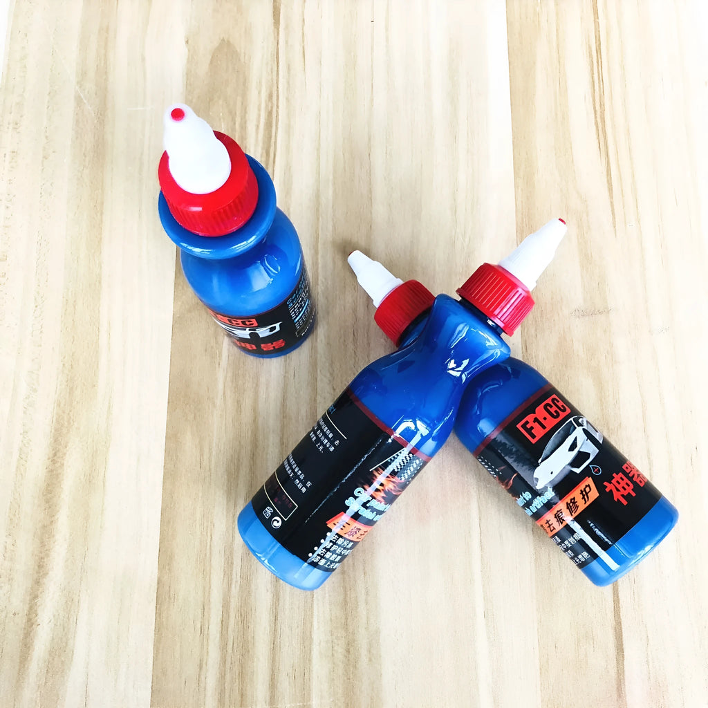 Automotive scratch repair agent bottle with dedicated wiping tool for car surface imperfections