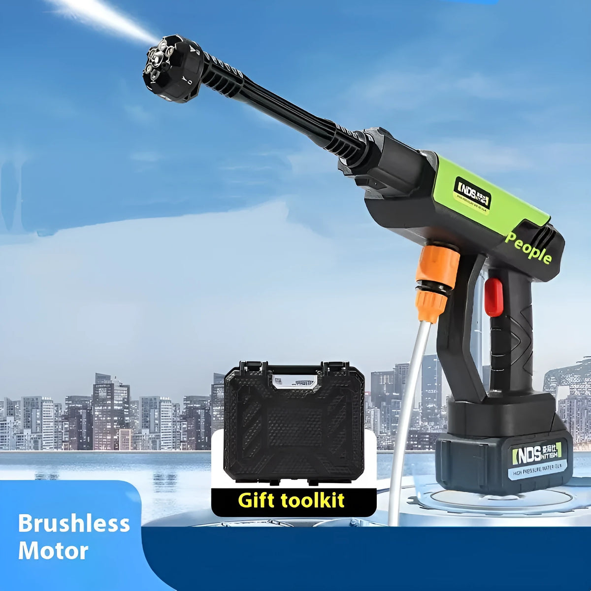 Green wireless high-pressure water gun with multiple nozzle attachments on a yellow toolbox