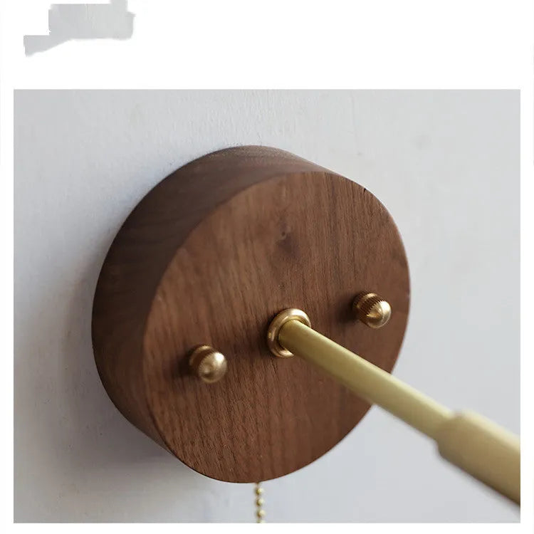 Nordic style wall-mounted bedside lamp in a wood colour finish.