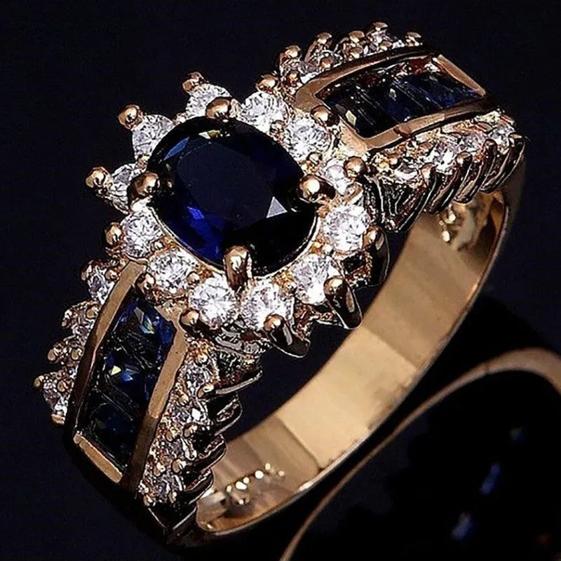 Zinc alloy ring with diamond treatment in blue and purple colour options showing unisex design