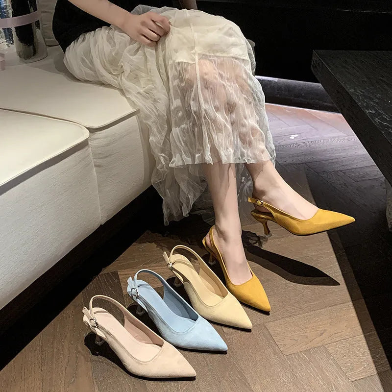 Women's pointed toe stiletto high heels in suede, shown in apricot colour on a light background.