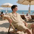 Linen beach suit set showing long sleeve shirt and matching shorts in light blue colour