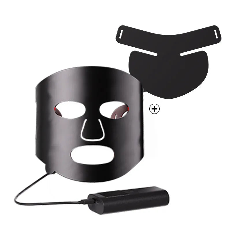 Black and white LED phototherapy face mask with controller showing seven different coloured light modes for skincare.