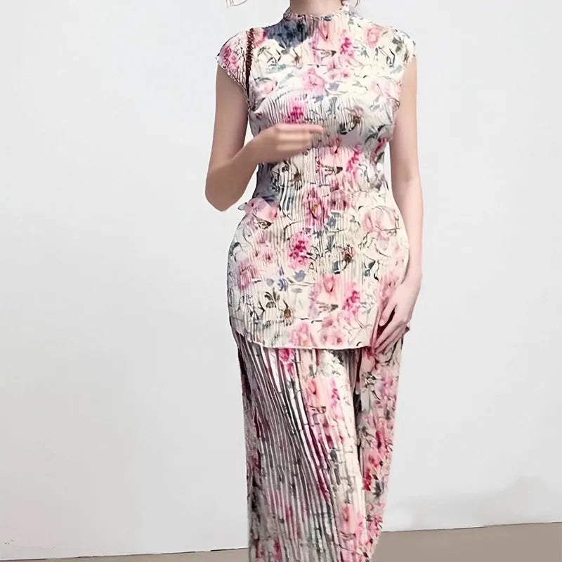 Long sleeve printed chiffon dress with matching top, high-waisted skirt design in picture colour.