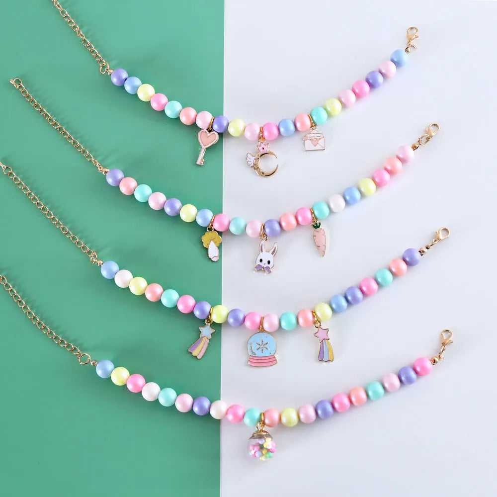 Colourful macaron pearl pet headdress collar and bracelet set for small animals in six colour options.