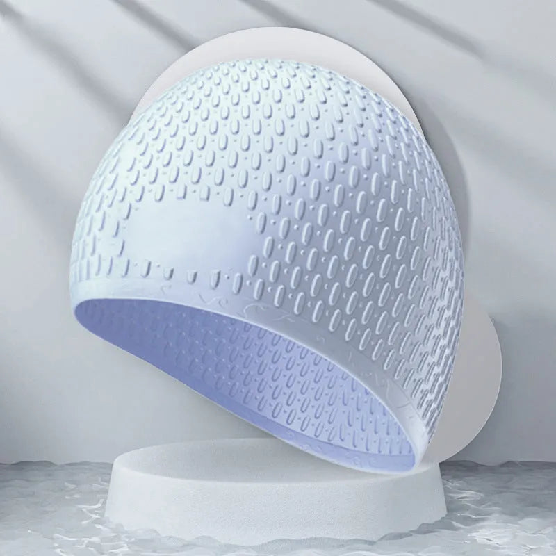 Silicone water drop style swimming cap for adults in various solid colours