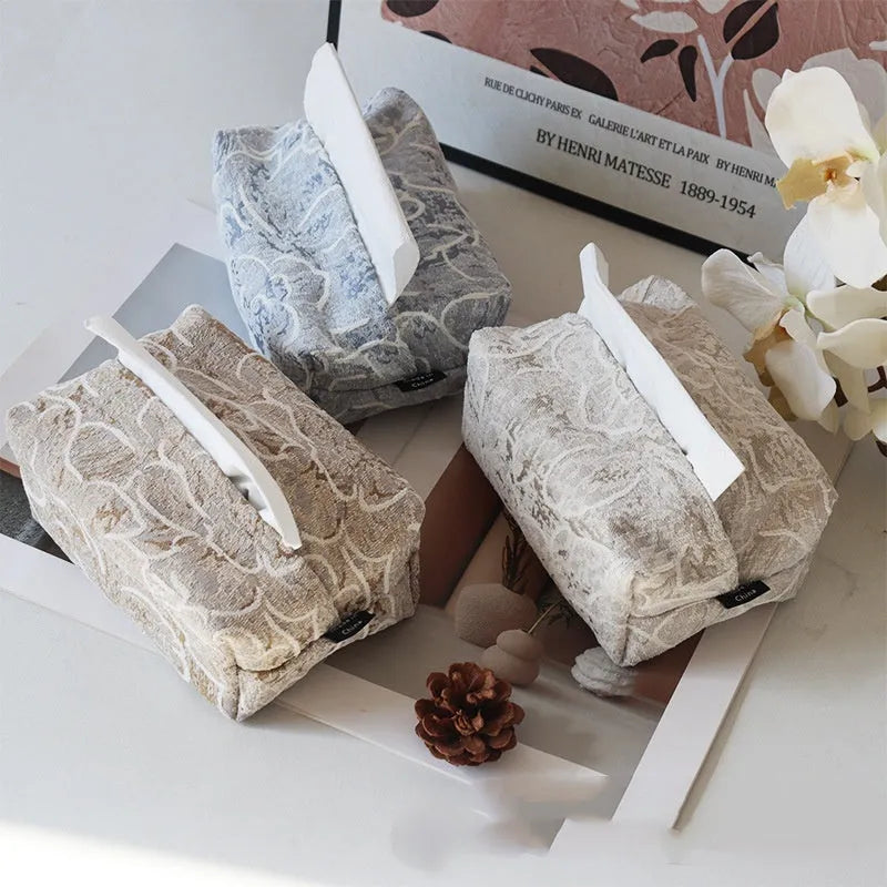 Cotton fabric floral tissue box cover in Chinese pastoral style on a table.