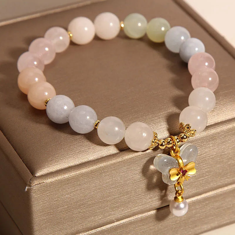 Women's crystal bracelet with a colourful morganite butterfly pendant in an original design.