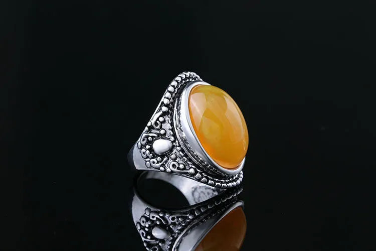 Geometric fluorescent beeswax design alloy ring in antique silver amber finish.