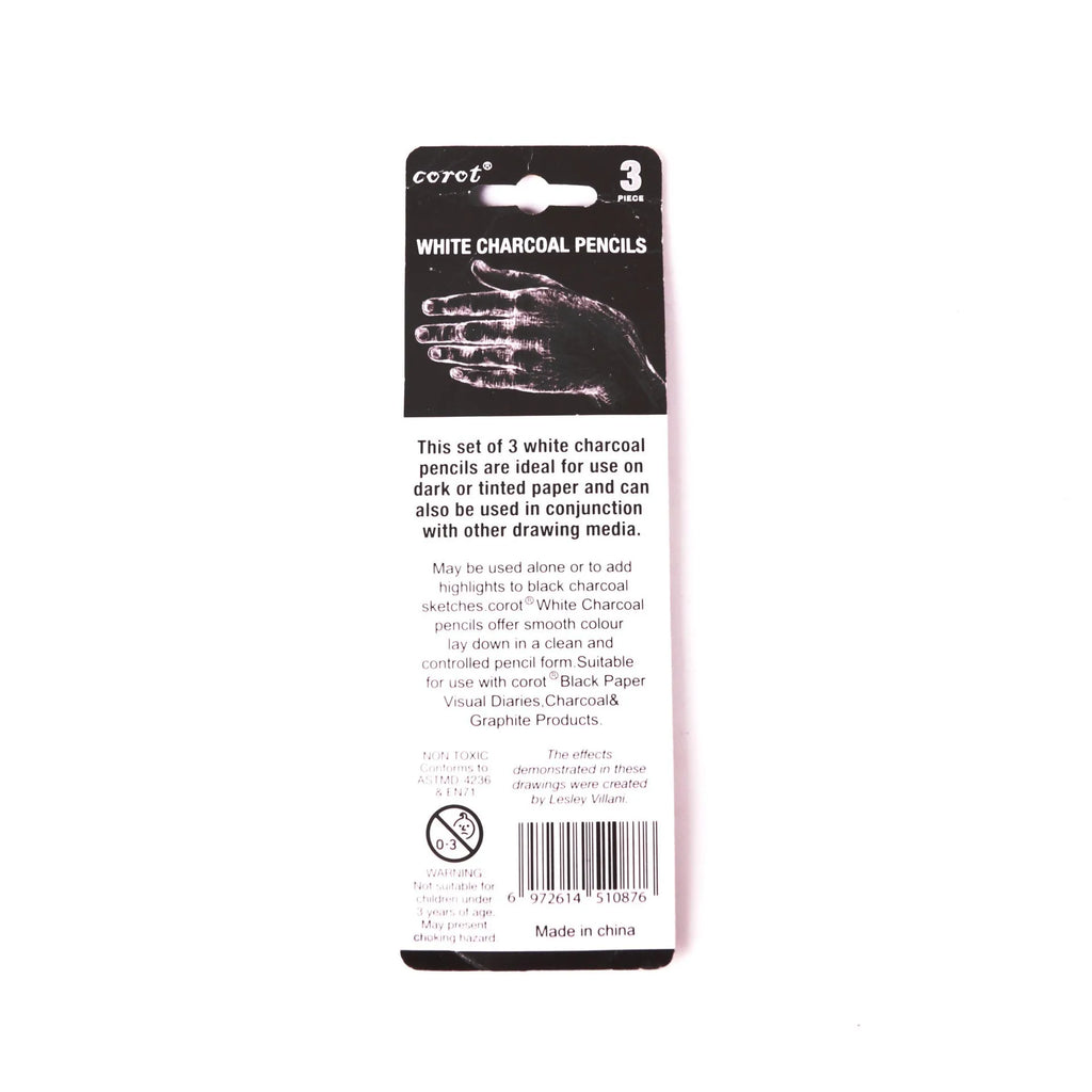 Three white charcoal drawing pencils with wooden barrels for sketching and highlighting