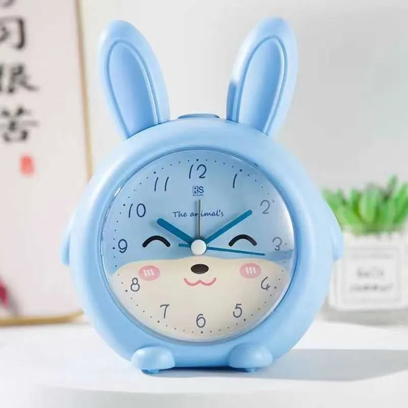 Cartoon children's singing alarm clock with night light in blue or pink colours