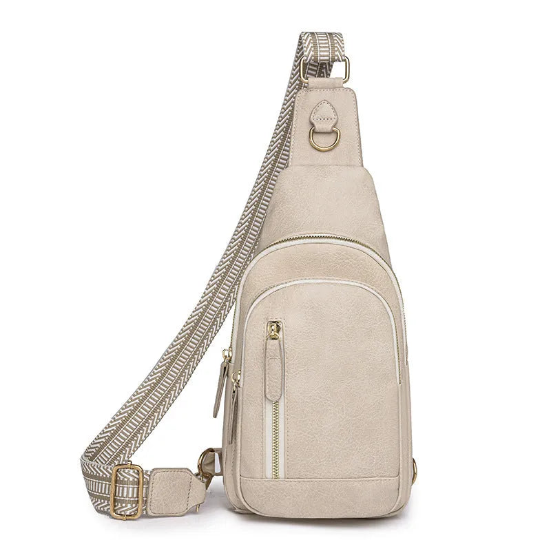Women's soft PU chest bag in street trend style with zipper pockets and sewing thread details