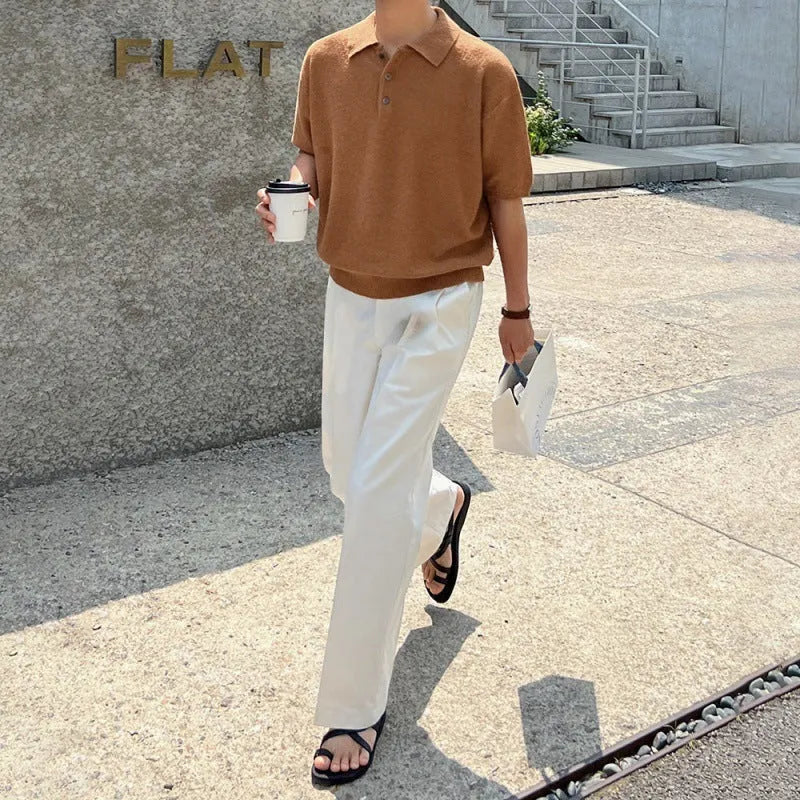 Men's caramel coloured retro asymmetric knitted polo shirt on a hanger, loose fit short sleeve.