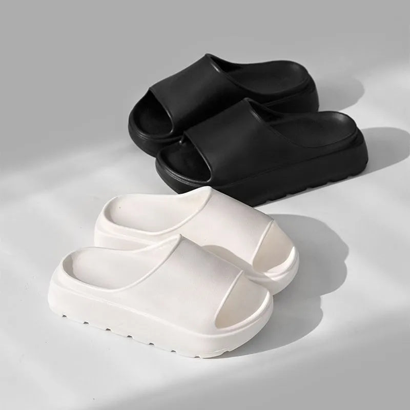 Women's beige fish mouth design EVA foam slippers with a thick 5.5cm sole.