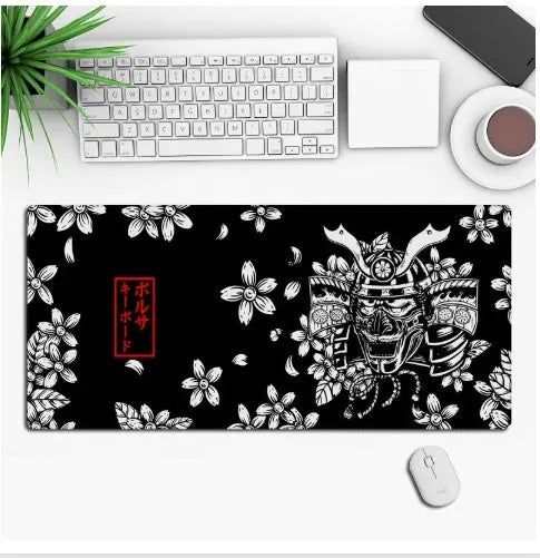 Anime design gaming mouse pad with non-slip rubber base shown on a desk