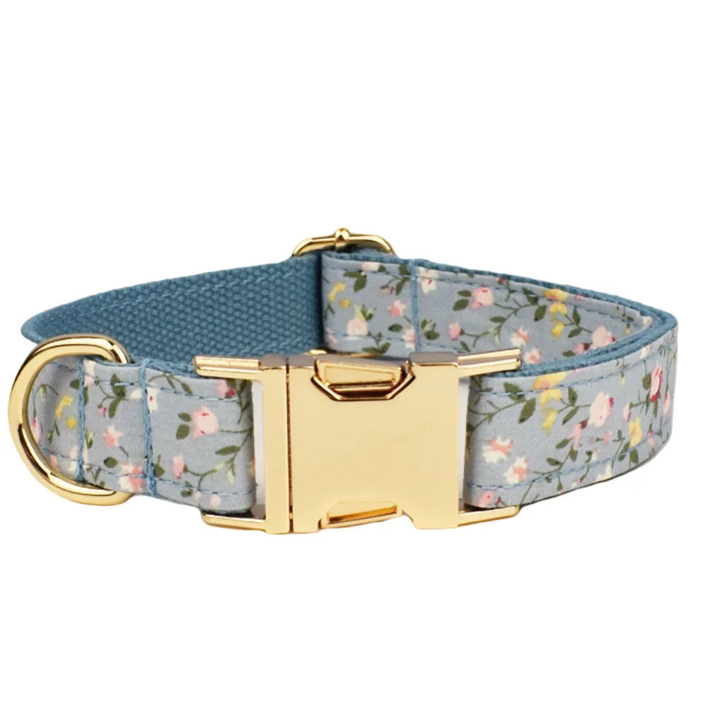 Blue floral polyester cotton dog collar with matching leash, bow tie, vest and poop bag holder set