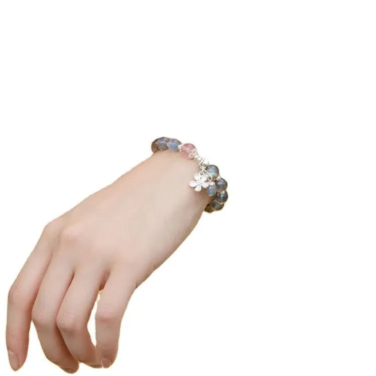 Women's 925 sterling silver bracelet with a grey moonlight stone bead and adjustable clasp.