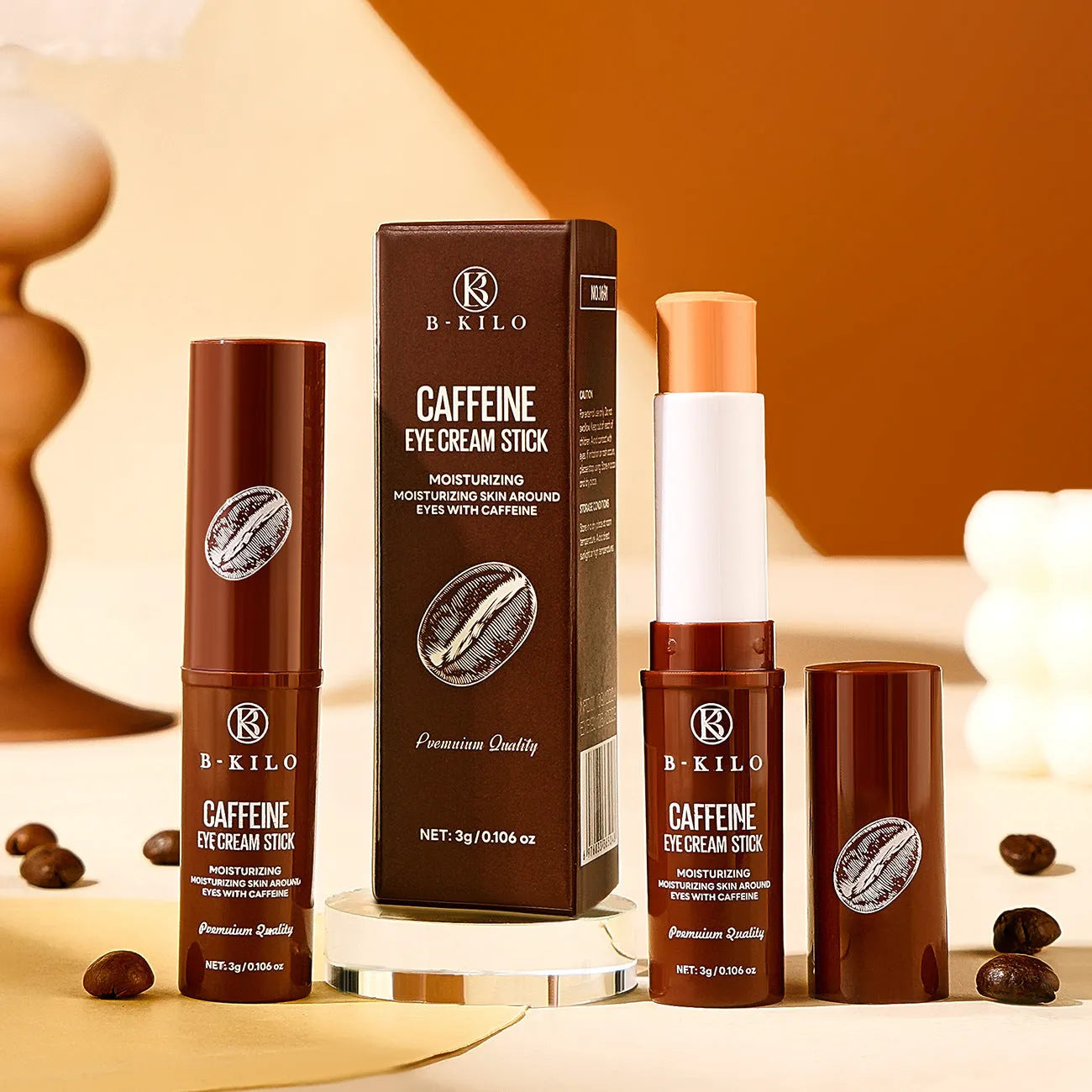 Caffeine eye cream stick in white packaging with roll-on applicator tip, 3g net content.