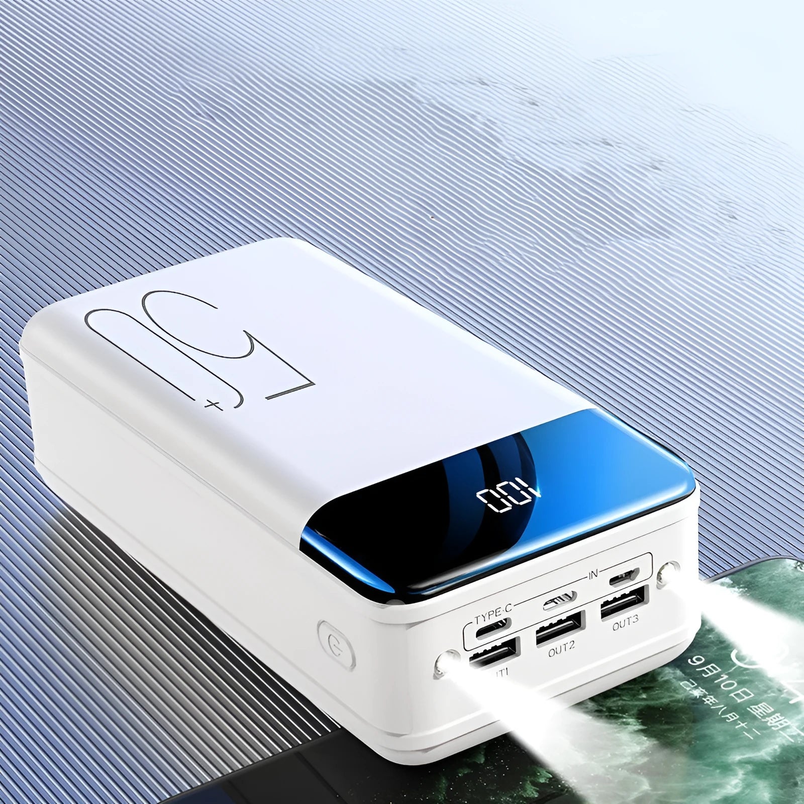 Black or white 50000 mAh power bank with three output ports measuring 169 x 83 x 52 mm