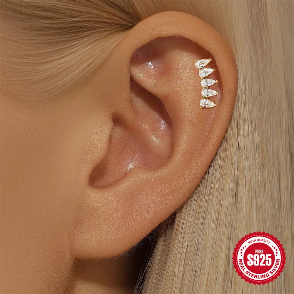 S925 sterling silver geometric moon earring with an embedded diamond star design in a gold colour finish.