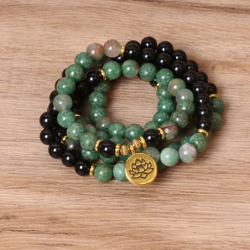 Green and black alloy elastic beaded long bracelet showing stretch design and personality-themed elements