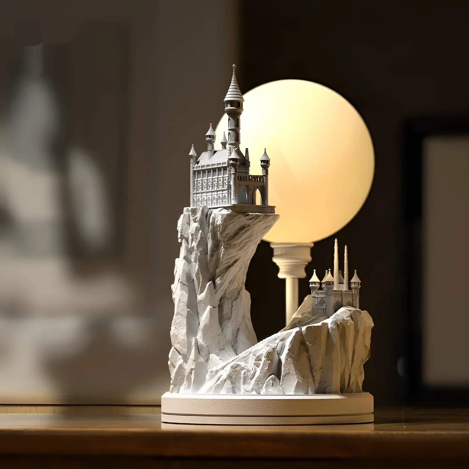 White composite gypsum table lamp with plug and wire switch on a table.