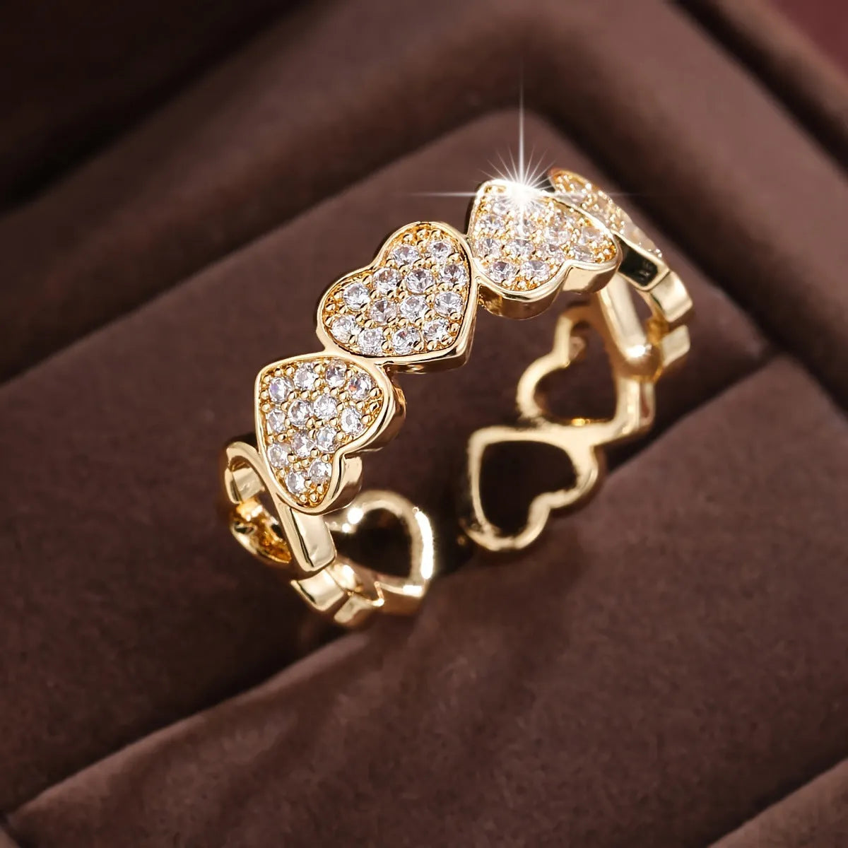 Adjustable opening couples ring with love heart design in gold or silver colour on geometric copper band
