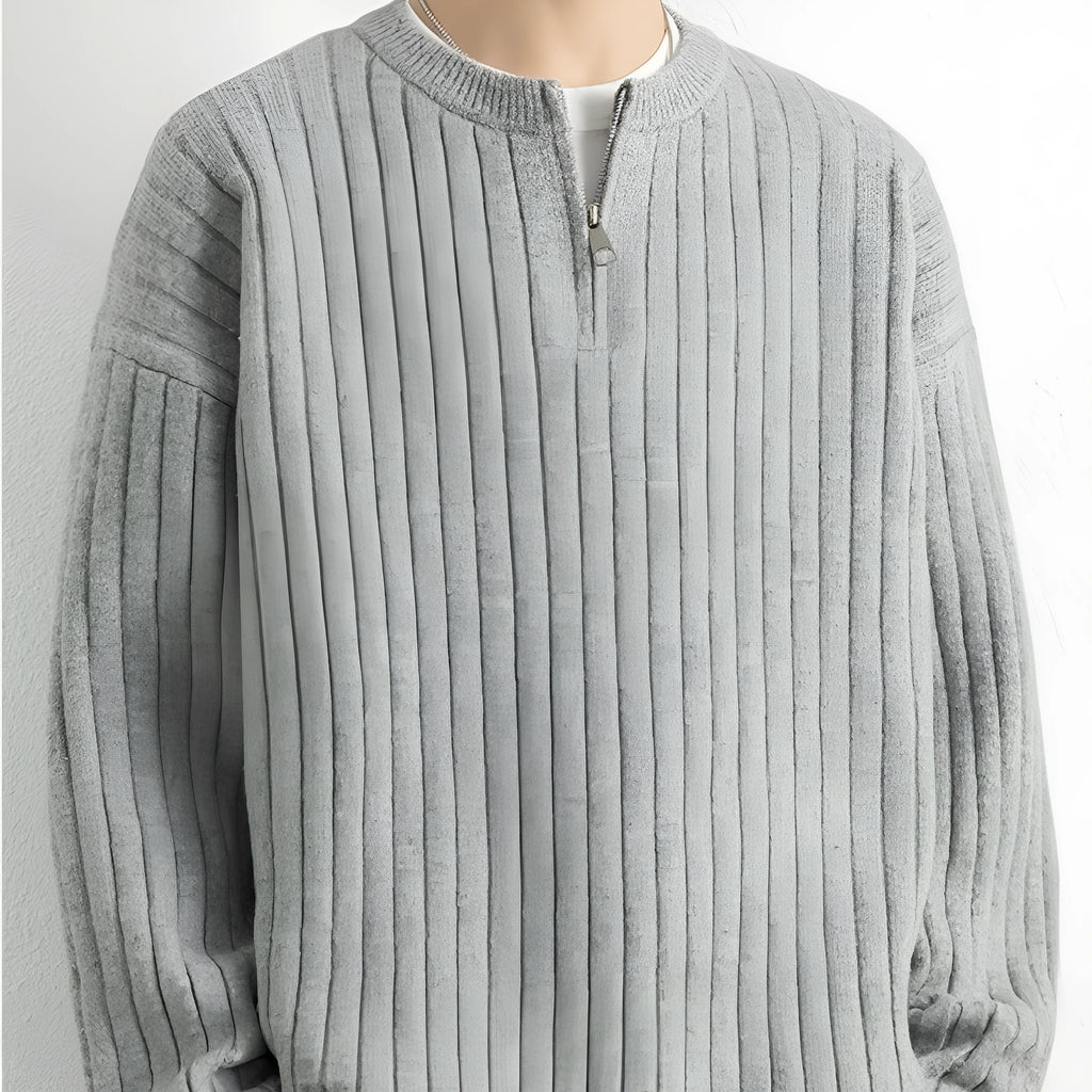 Men's grey half zip textured knit sweater with loose fit and long sleeves