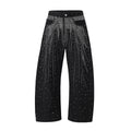 Blue and black women's loose-fitting cotton wide-leg trousers on a hanger.
