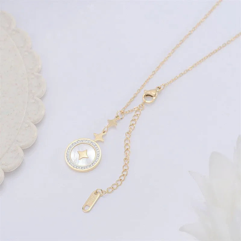 Gold titanium steel necklace with six-pointed star pendant and diamond accents on 42cm chain