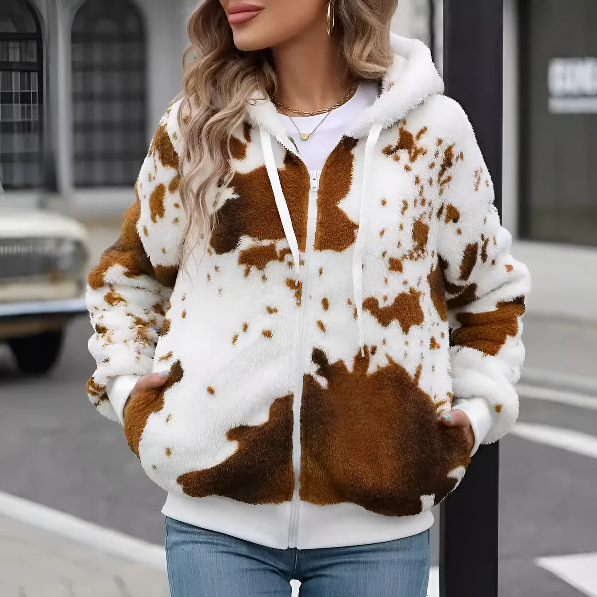 Yellow brown cow animal print hooded cardigan jacket with zipper front and street fashion styling